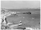 The prize - Port Moresby, August 1942.  The port with the harbour entrance clearly visible in the background.  Part of the township can be seen on the left with the headland of Paga Point rising behind it.  A coastal defence battery (out of sight here) of two 6-inch Mk XI guns had been installed at Paga Point in July 1939.